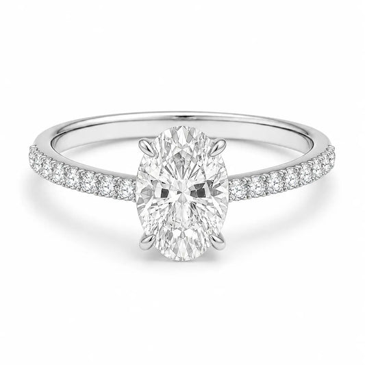 2 carat oval cubic zirconia engagement ring with pavé band in silver setting