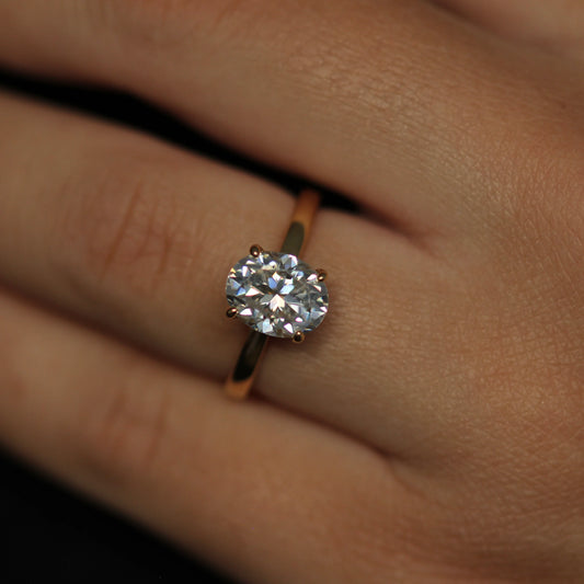 2 carat oval moissanite engagement ring with 14k gold filled band