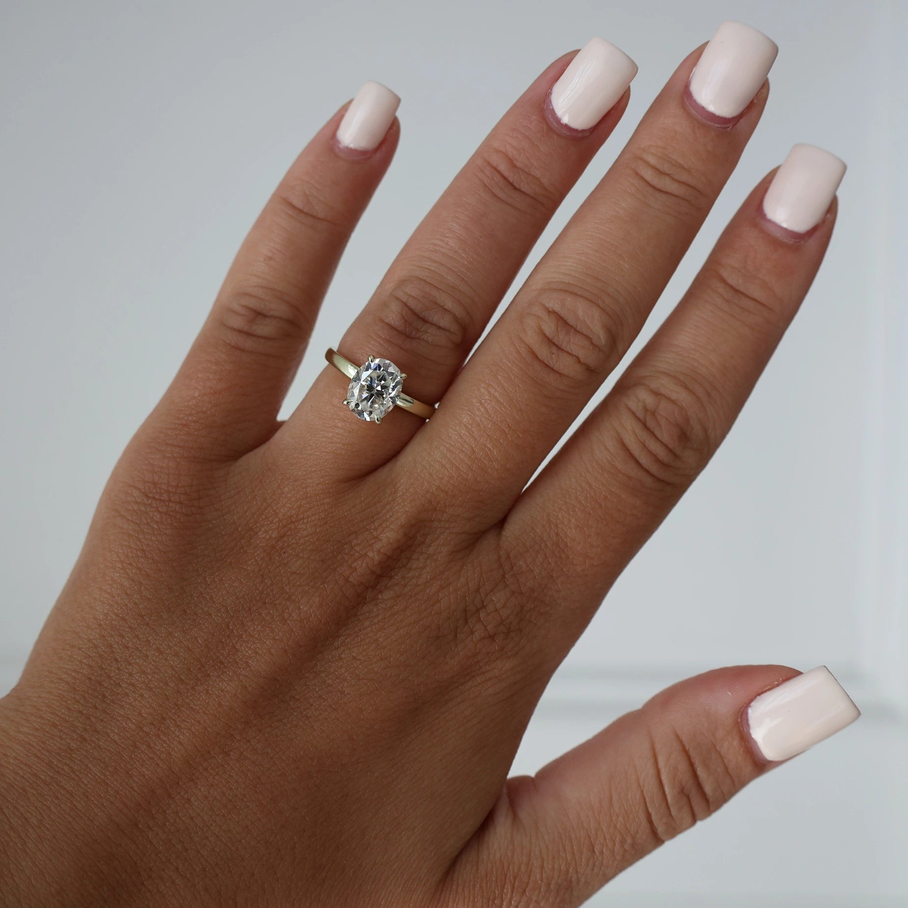 2 carat oval moissanite ring in light 14k gold filled