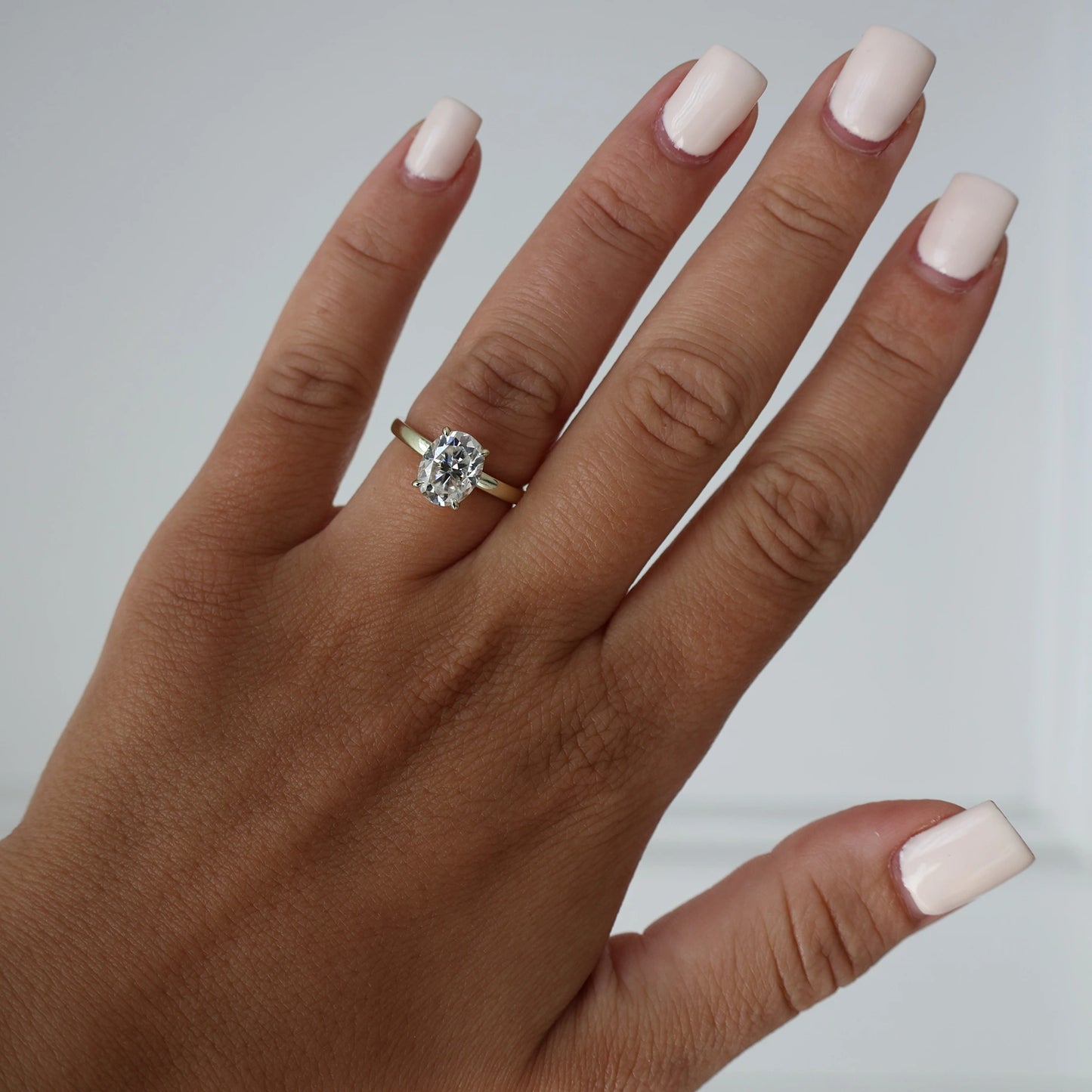 2 carat oval moissanite ring in light 14k gold filled