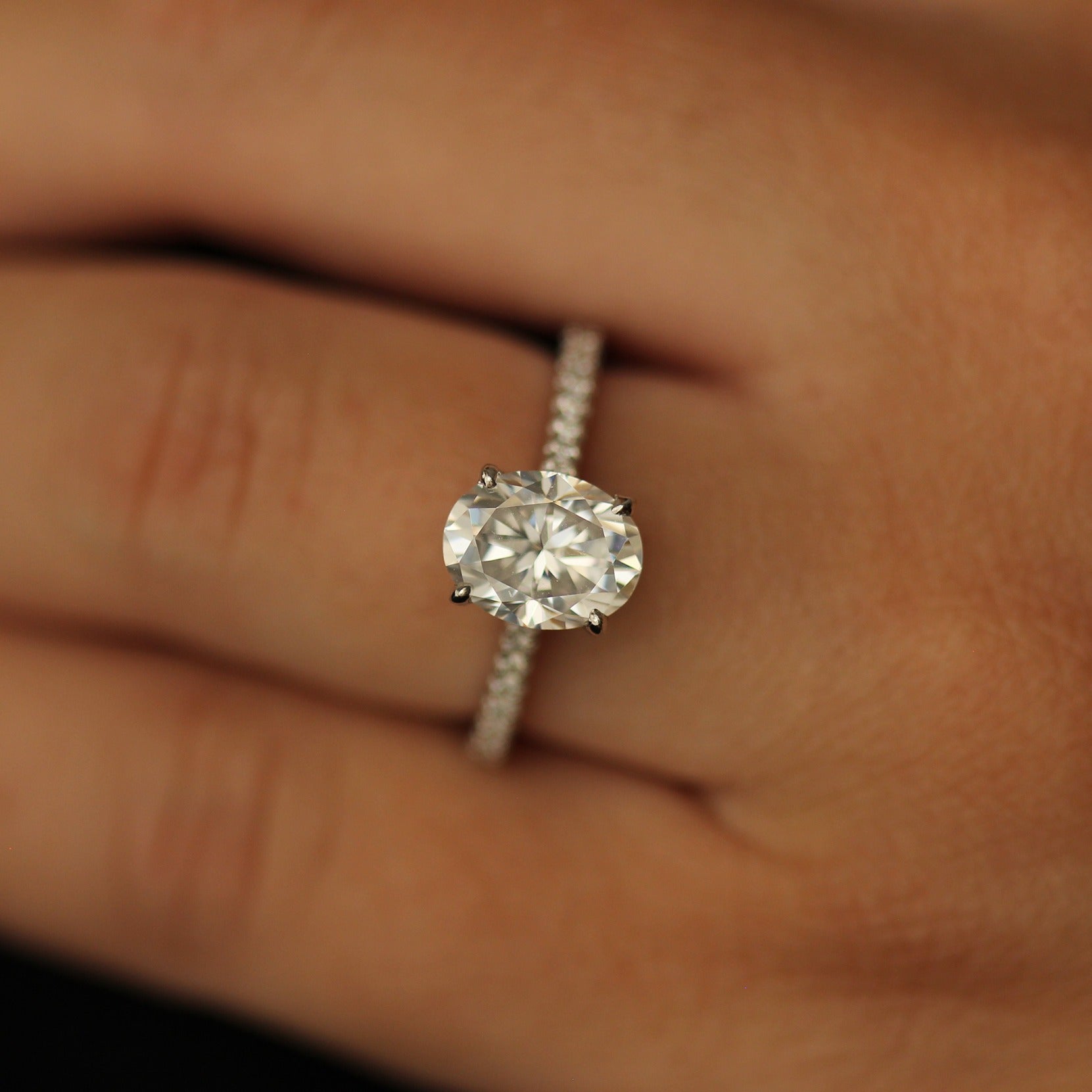 2 carat oval moissanite pave set  ring