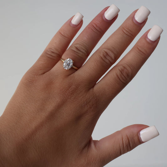 2 carat oval moissanite ring in 14k solid gold