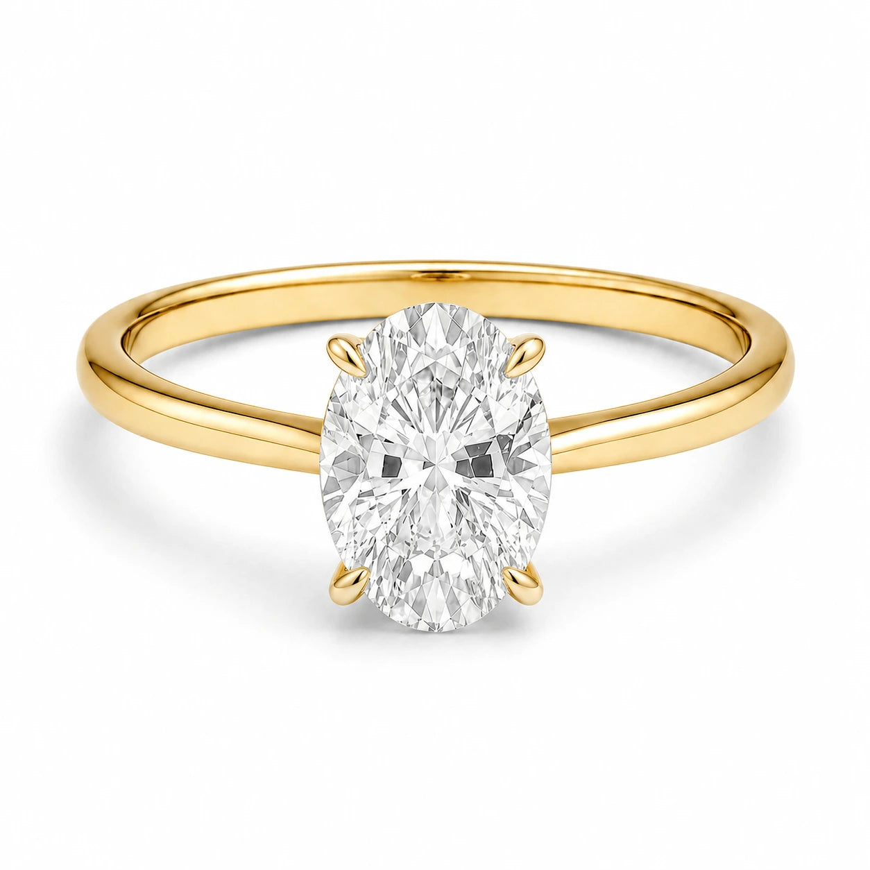 18k gold plated solitaire ring featuring a 2 carat oval cubic zirconia stone