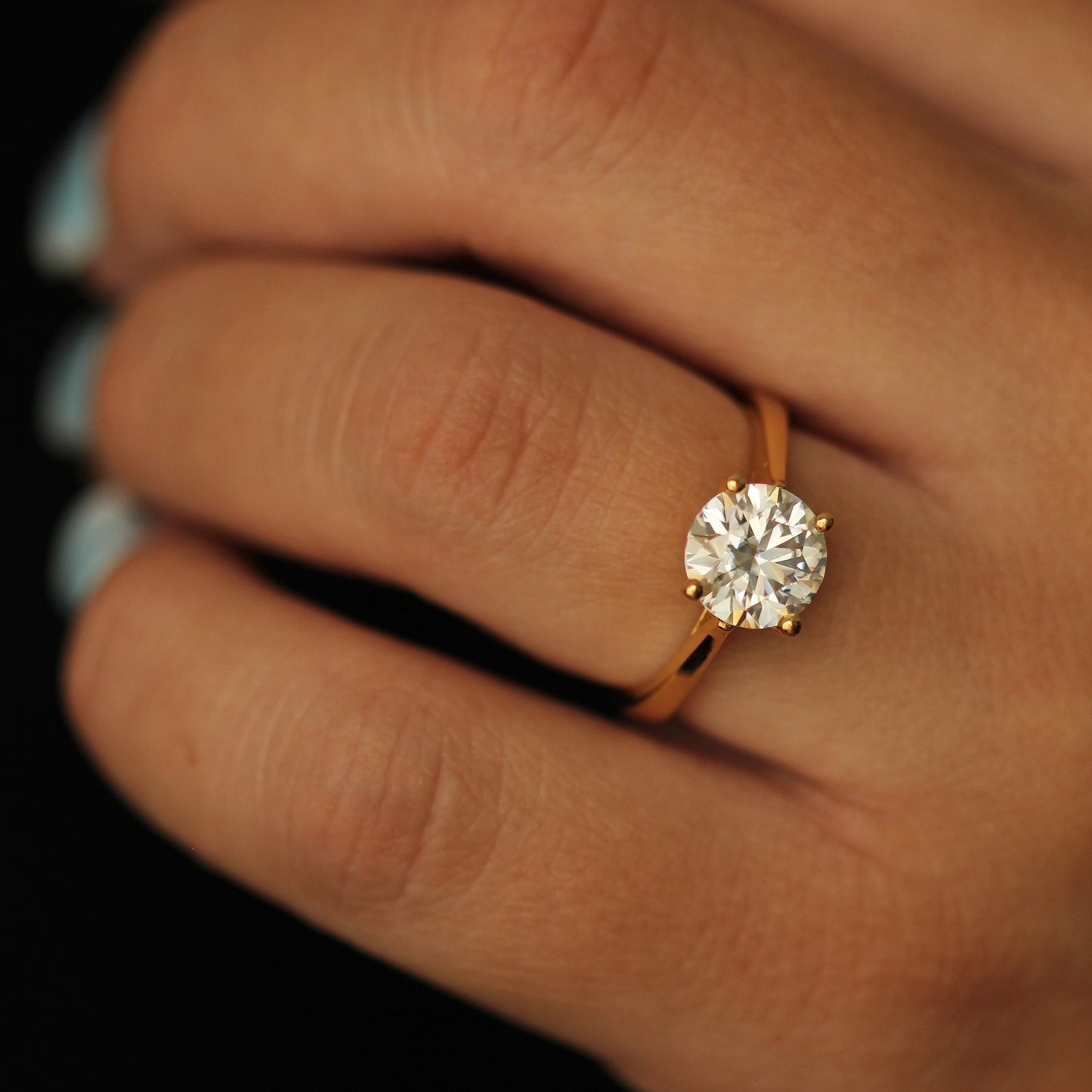 14k gold filled round cut ring on hand