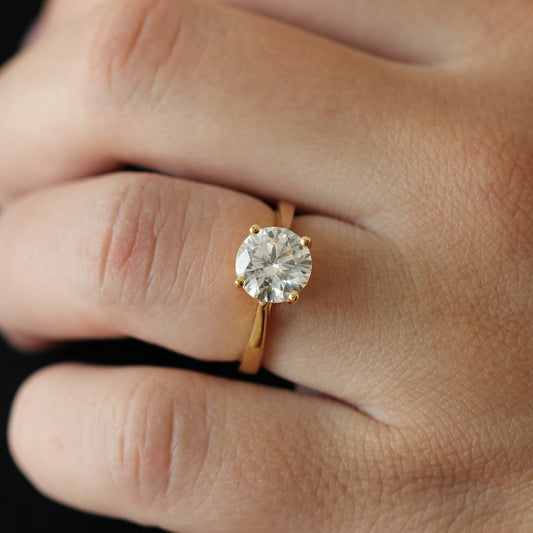 2 carat oval solitaire moissanite ring with a 14k gold filled tapered band