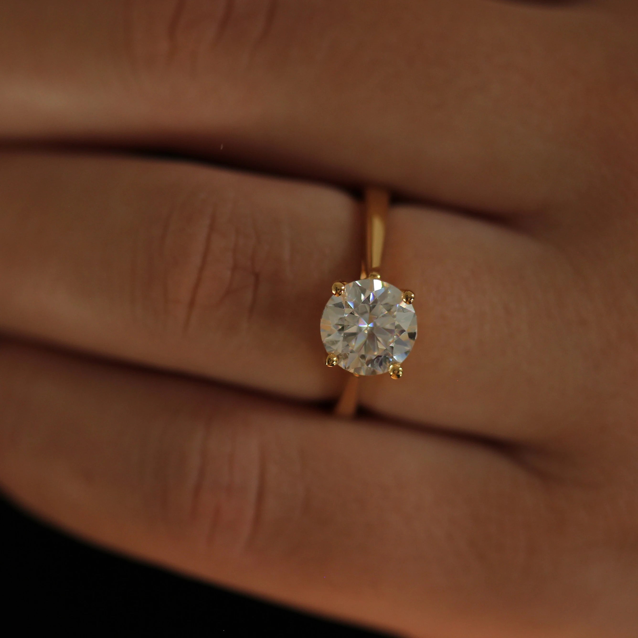 2 carat oval solitaire moissanite ring with a 14k gold filled tapered band