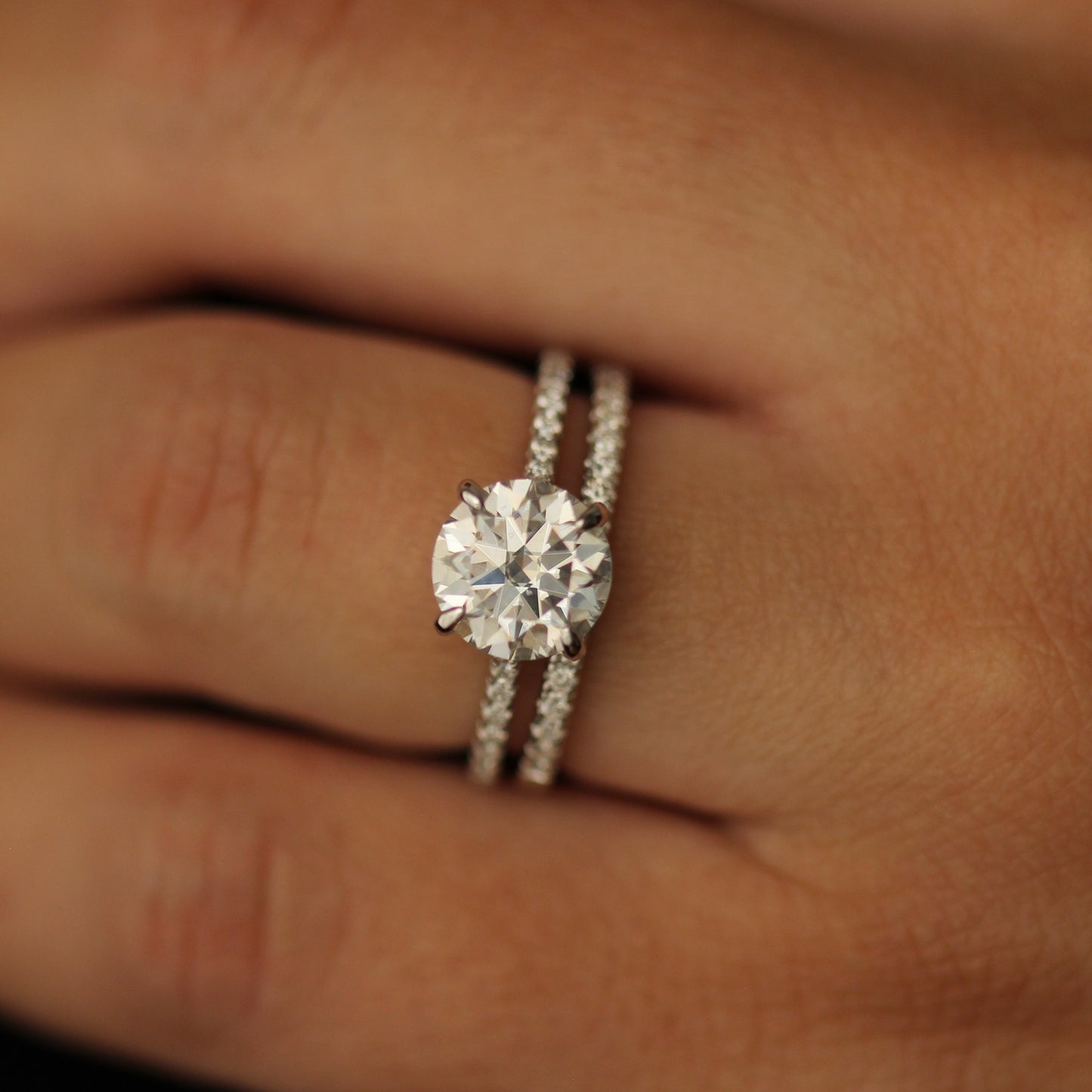 2 carat pavé set moissanite ring stacked with a half pavé band