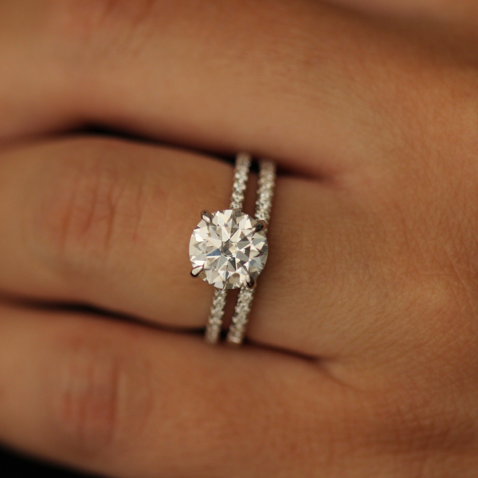 2 carat pavé set moissanite ring stacked with a half pavé band