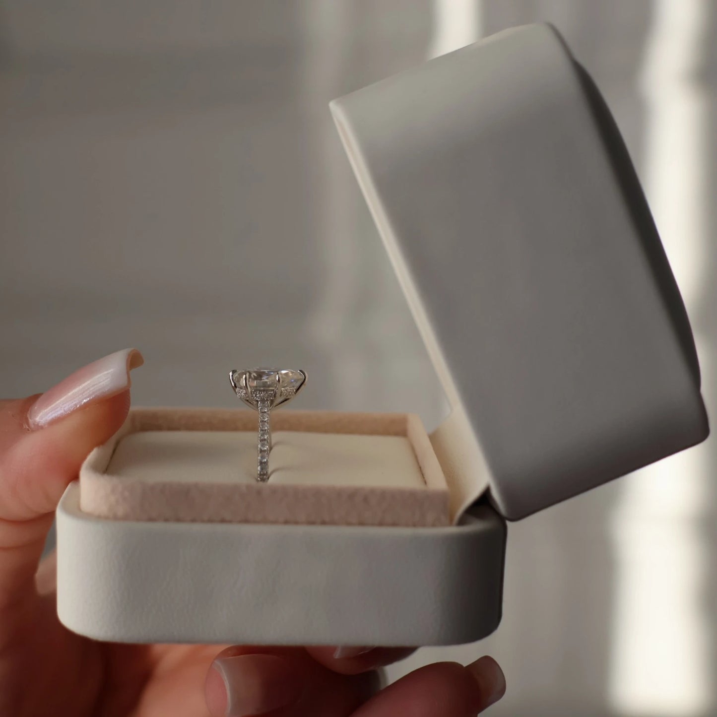 2 ct pear moissanite silver ring with hidden halo in engagement ring box