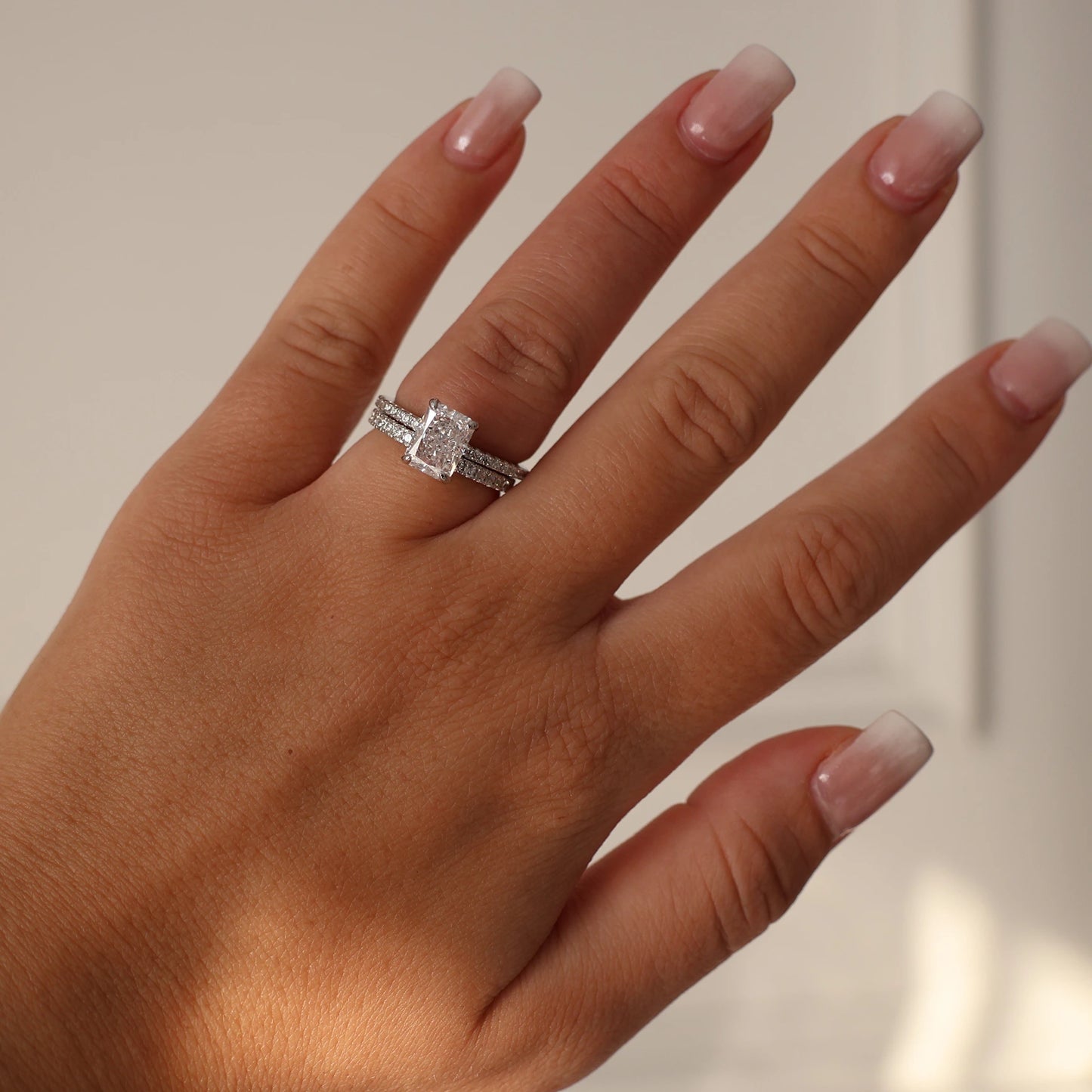 2 carat radiant cut cubic zirconia ring with pavé silver band