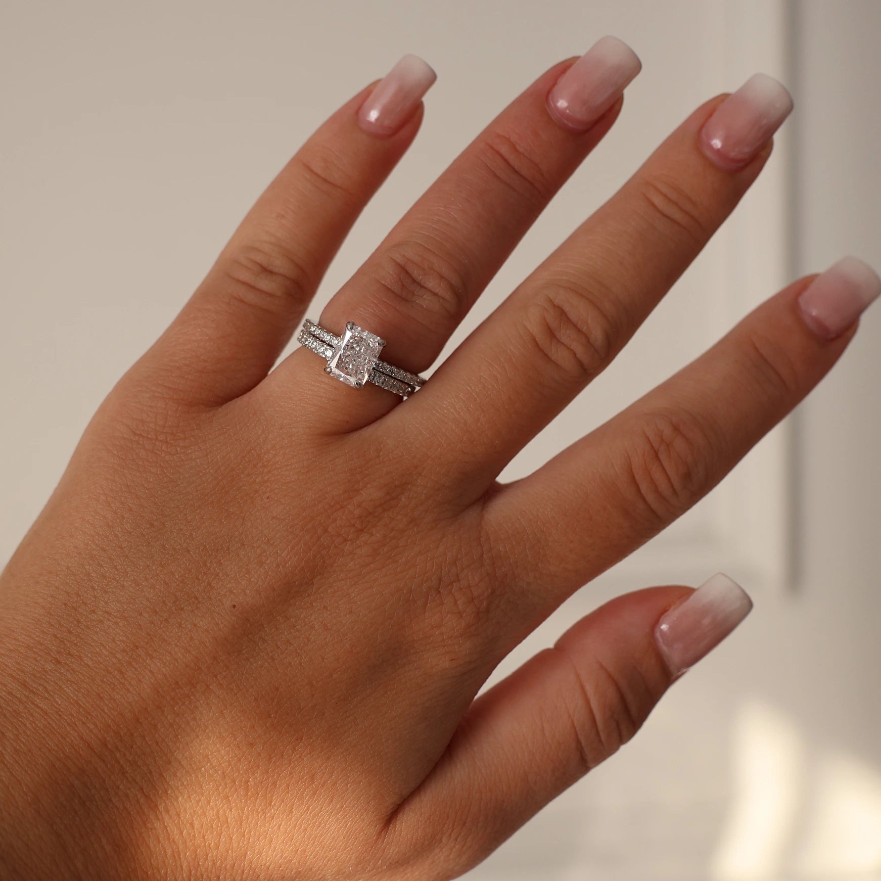 2 carat radiant cut cubic zirconia ring with pavé silver band