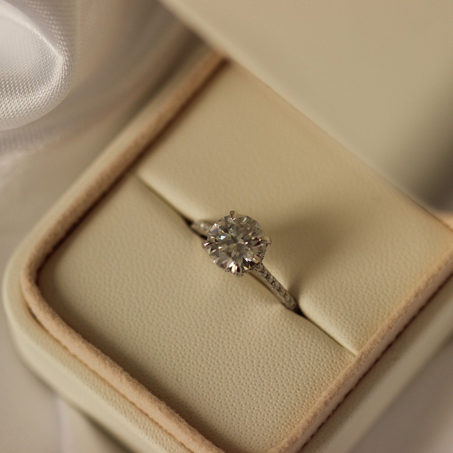2 carat round moissanite pave engagement ring in ring box