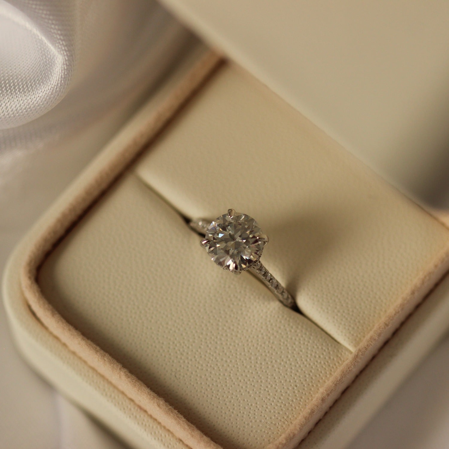 2 carat round moissanite pave engagement ring in ring box