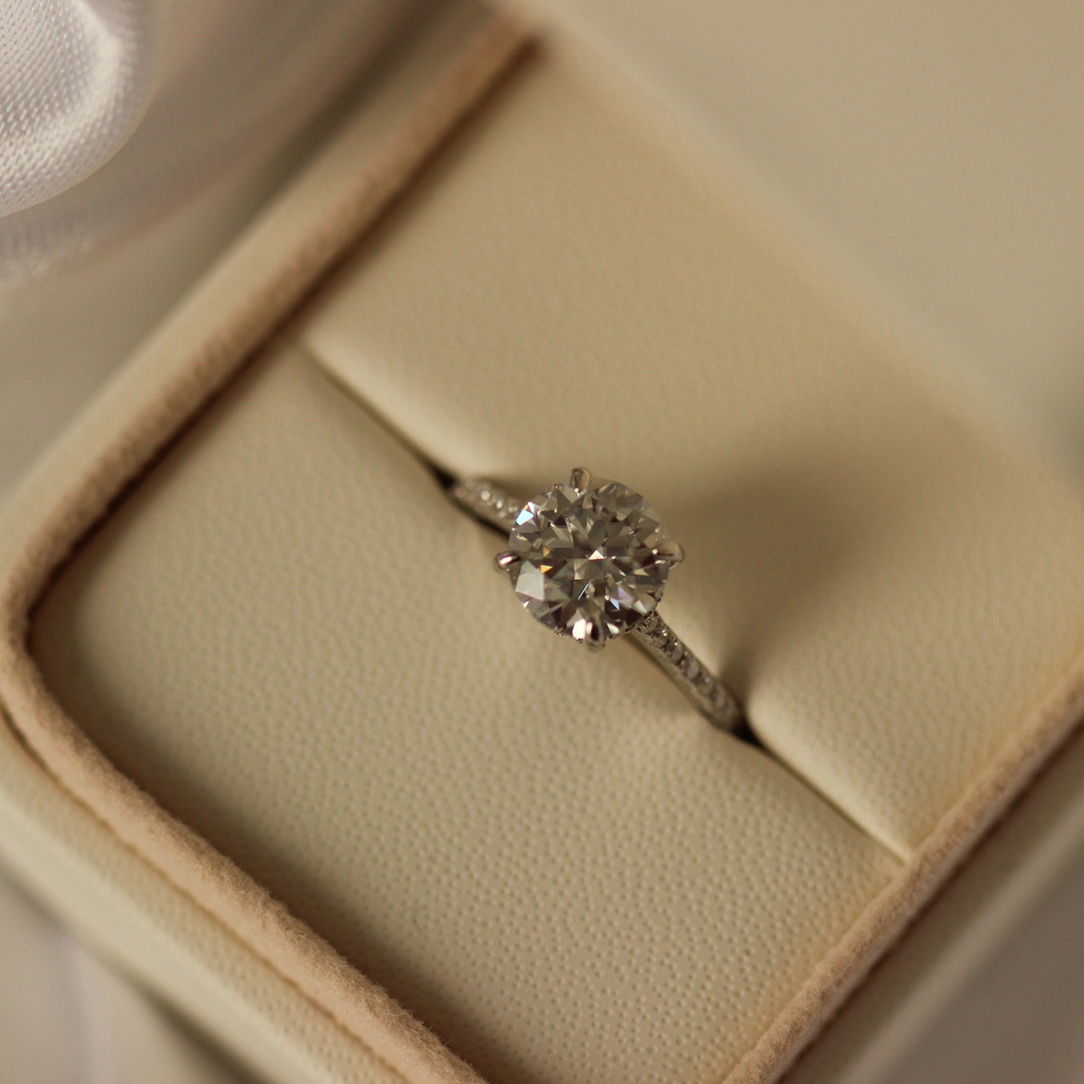 2 carat round moissanite pave ring in ring box