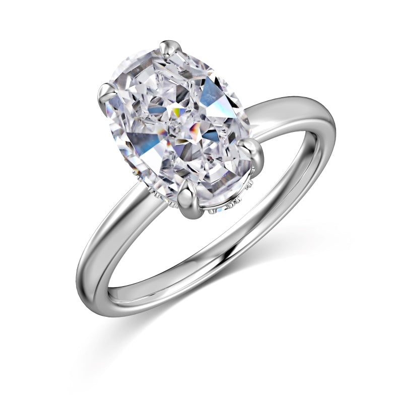 2 carat silver oval ring with hidden halo on white background
