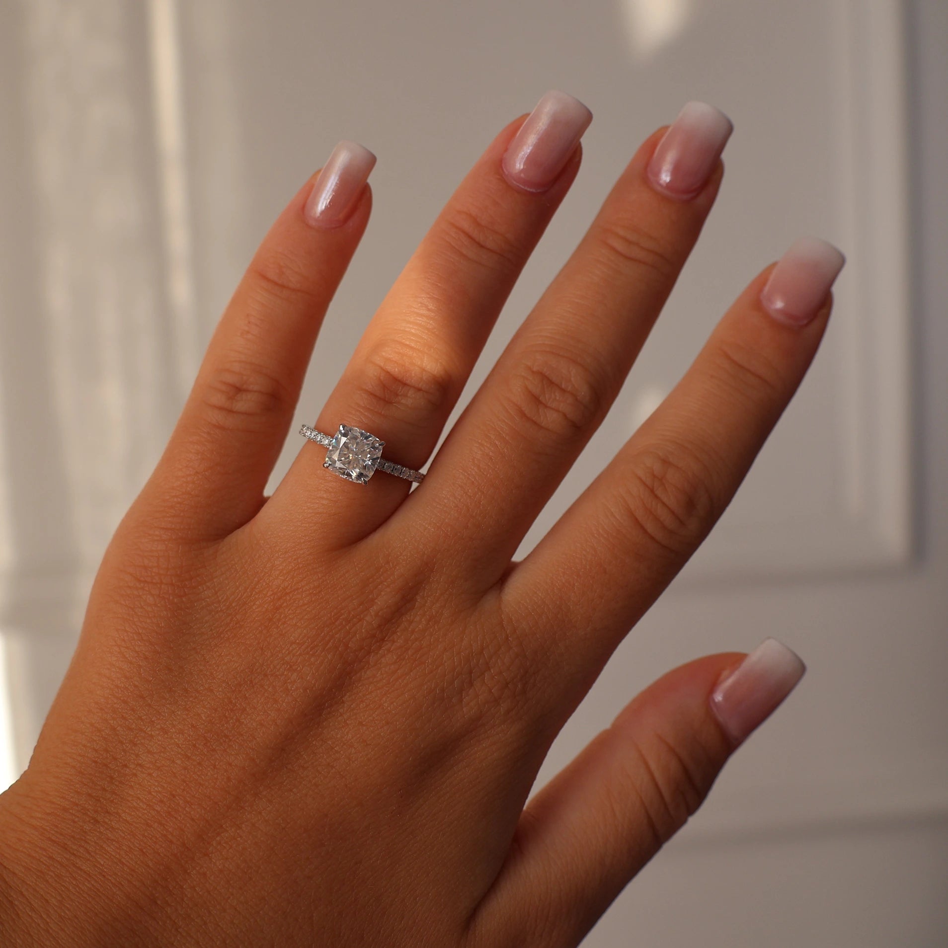 2 ct cushion moissanite ring with pave band