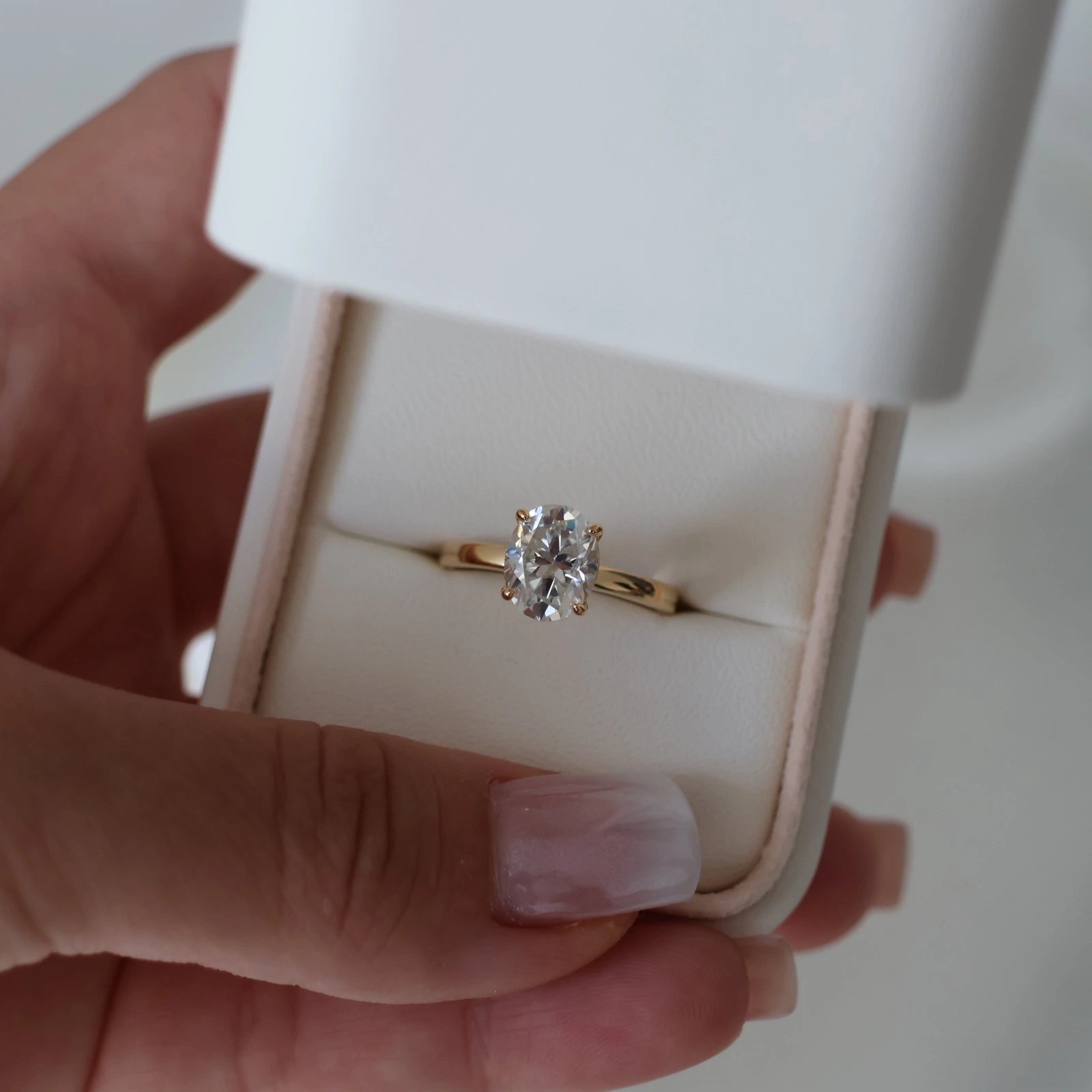carat oval moissanite solitaire ring in 14k gold filled displayed in proposal box
