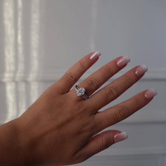 silver 2 ct solitaire ring featuring hidden halo and open band stack