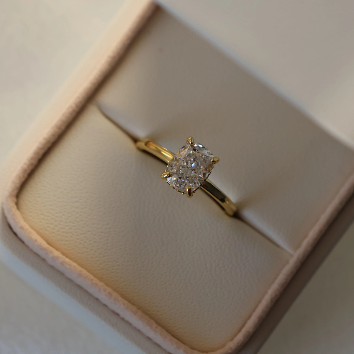 2.5 ct elongated cushion CZ engagement ring in 14K gold plated finish
