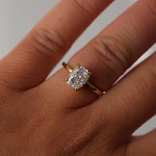 2.5 ct elongated cushion cubic zirconia engagement ring with hidden halo and 14K gold plating