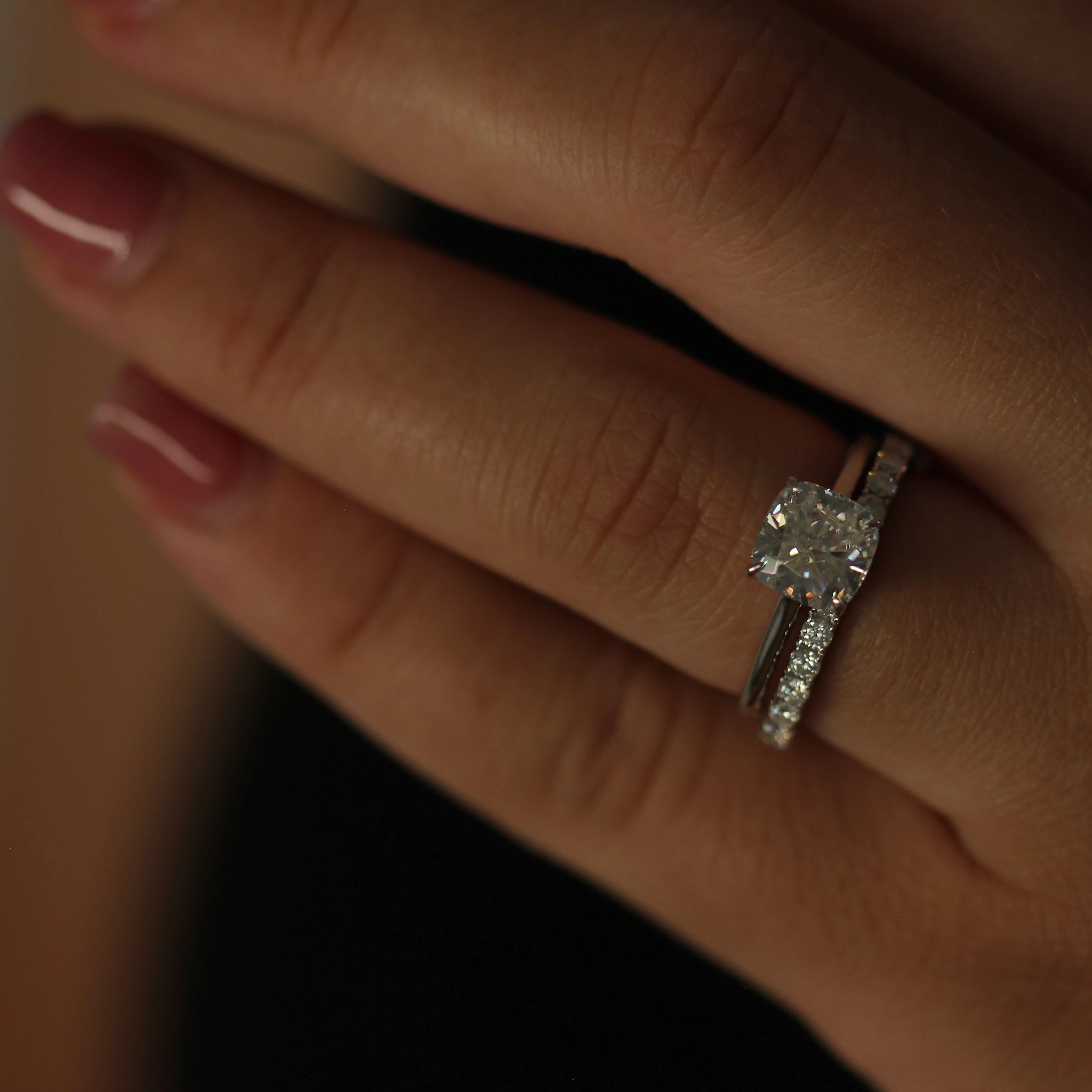 2 ct cushion cut solitaire moissanite engagement ring stacked with half eternity wedding band