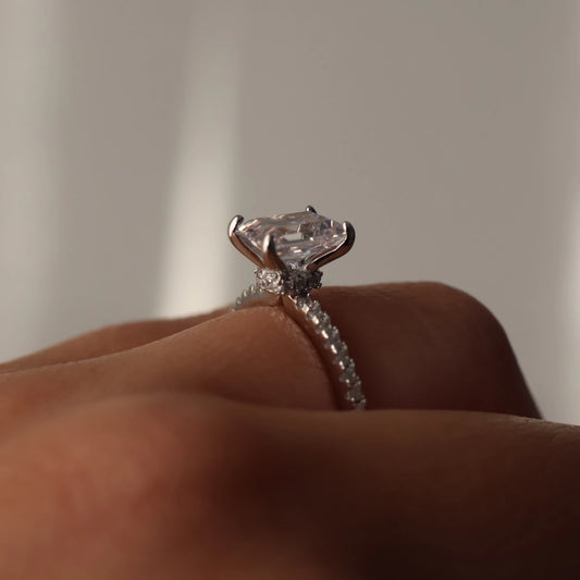 2 carat emerald cubic zirconia silver ring with hidden halo and pave band