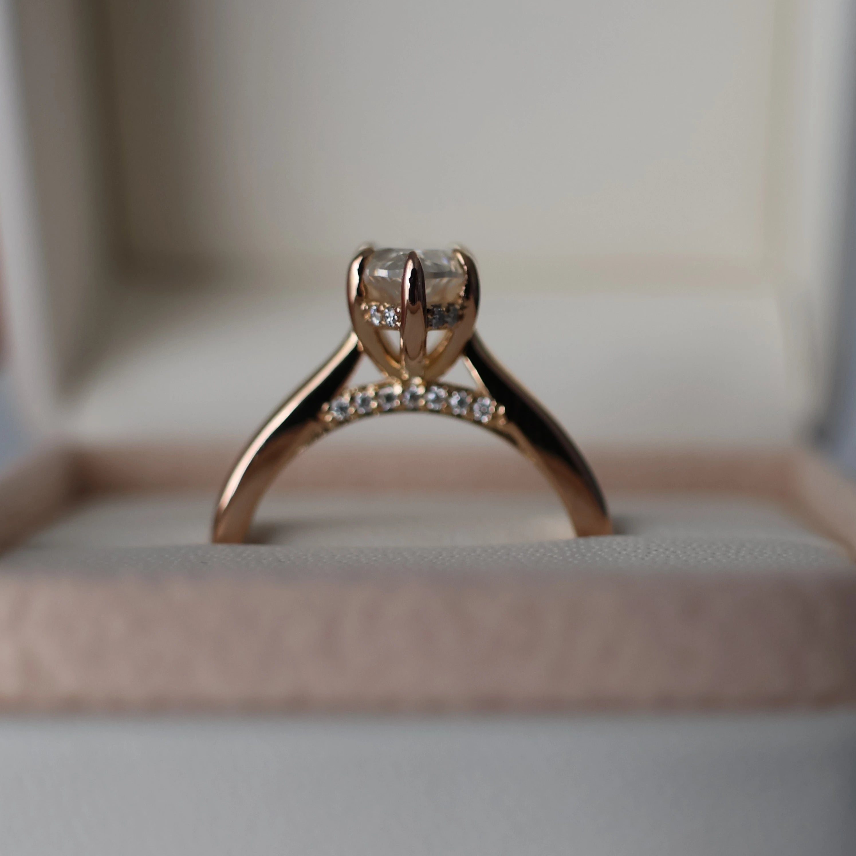 2 ct marquise moissanite ring with hidden halo displayed inside a proposal box