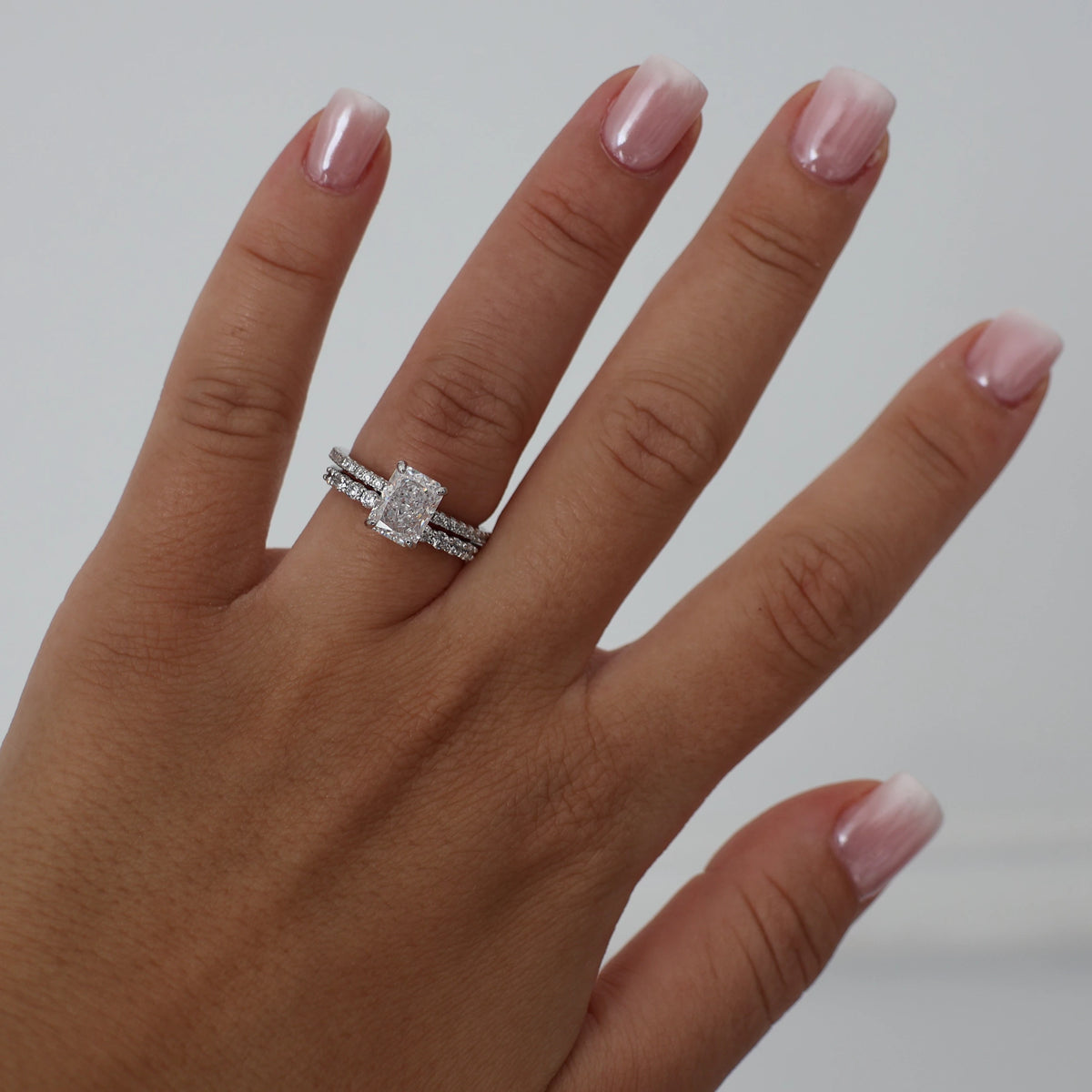 2 ct radiant cut cubic zirconia silver pavé engagement ring stacked with a pavé band