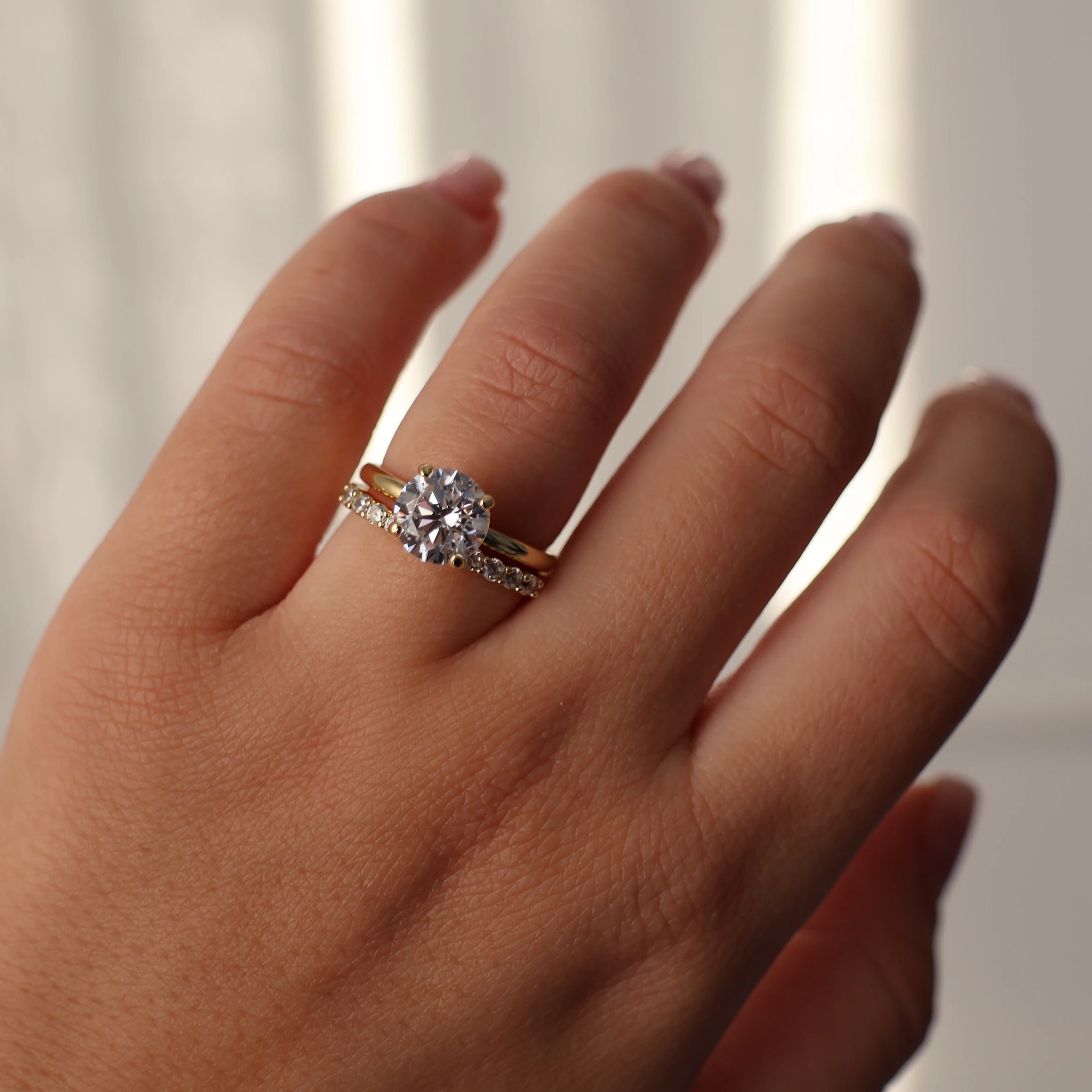 2 ct round 14k gold plated solitaire engagement ring worn on hand