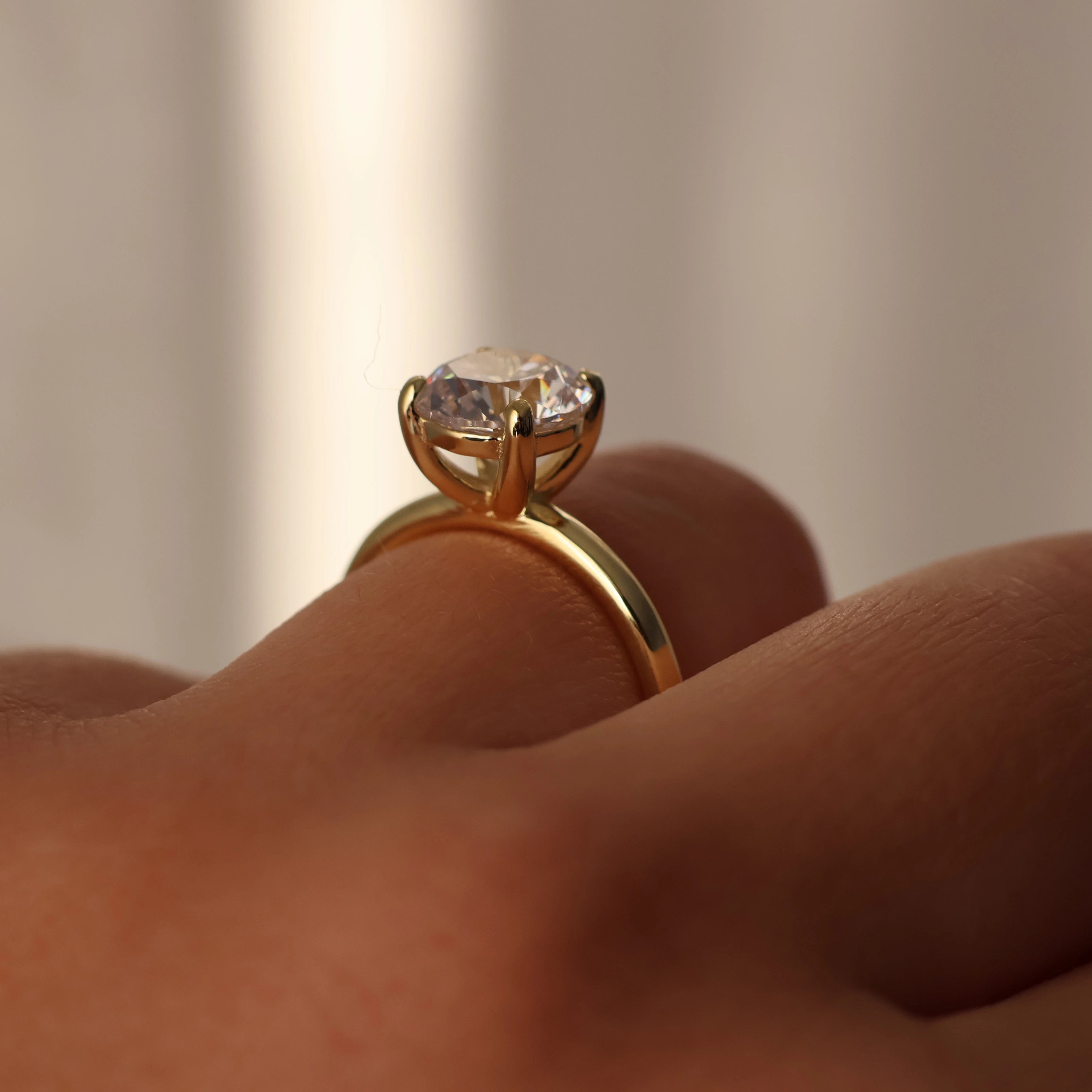 Side view of 2 ct round gold solitaire engagement ring 14k gold plating