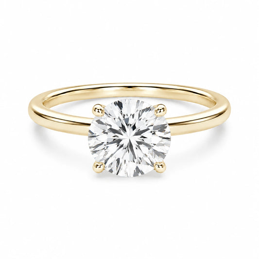 2 ct round gold engagement ring on white background