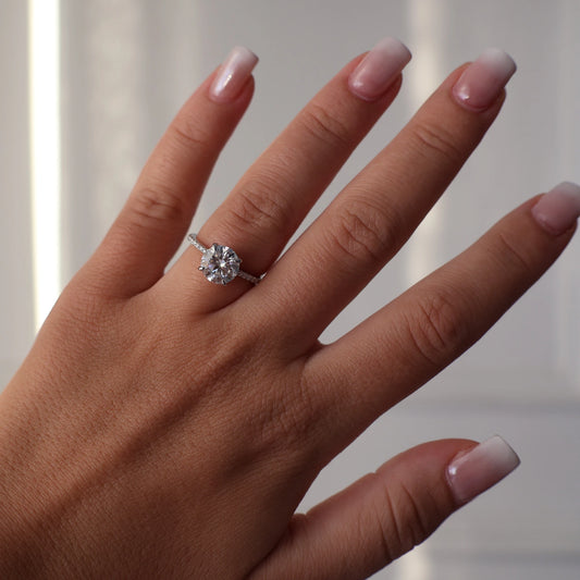 2ct round cut moissanite ring with pavé silver band