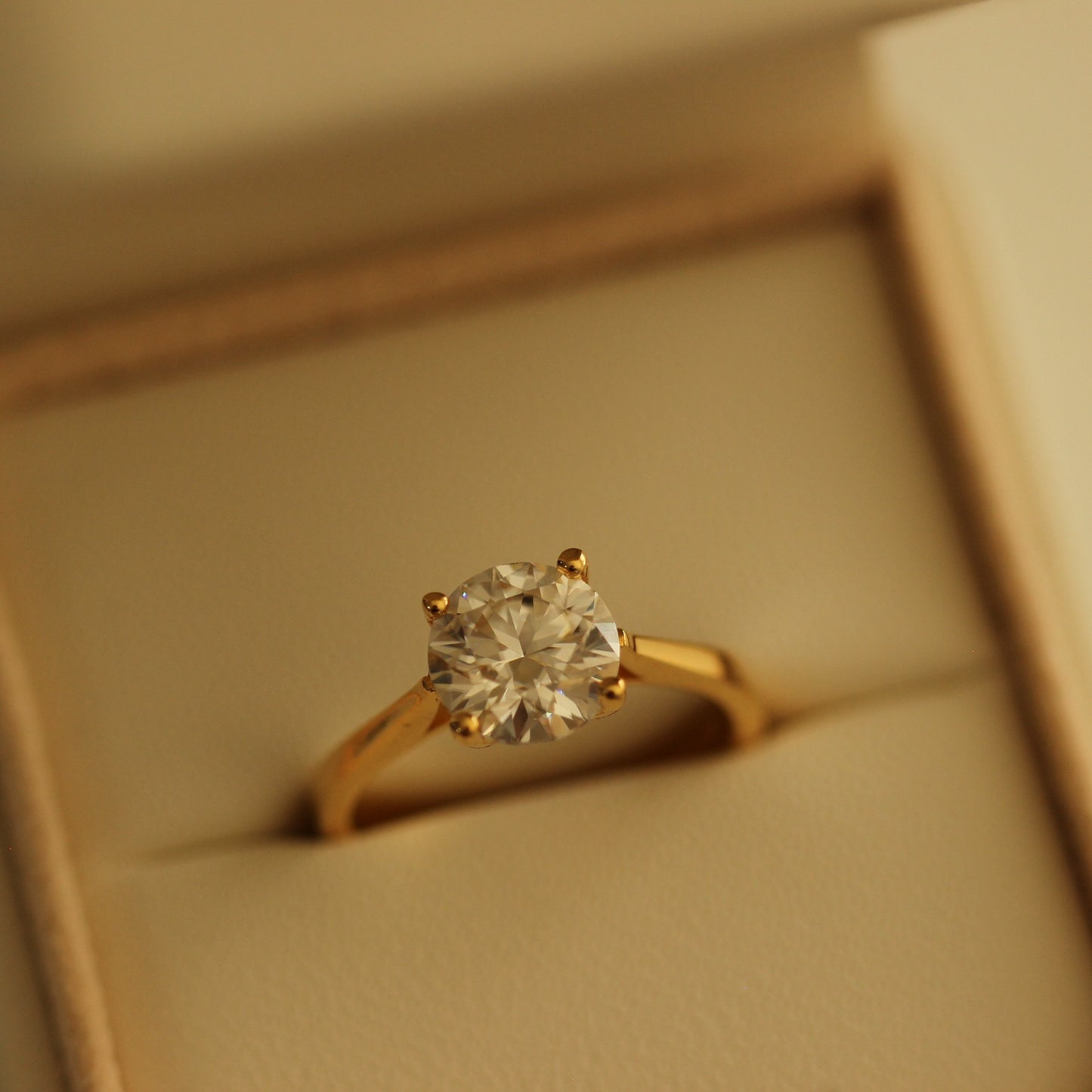 2 carat round solitaire moissanite ring with a 14k gold filled in proposal ring box