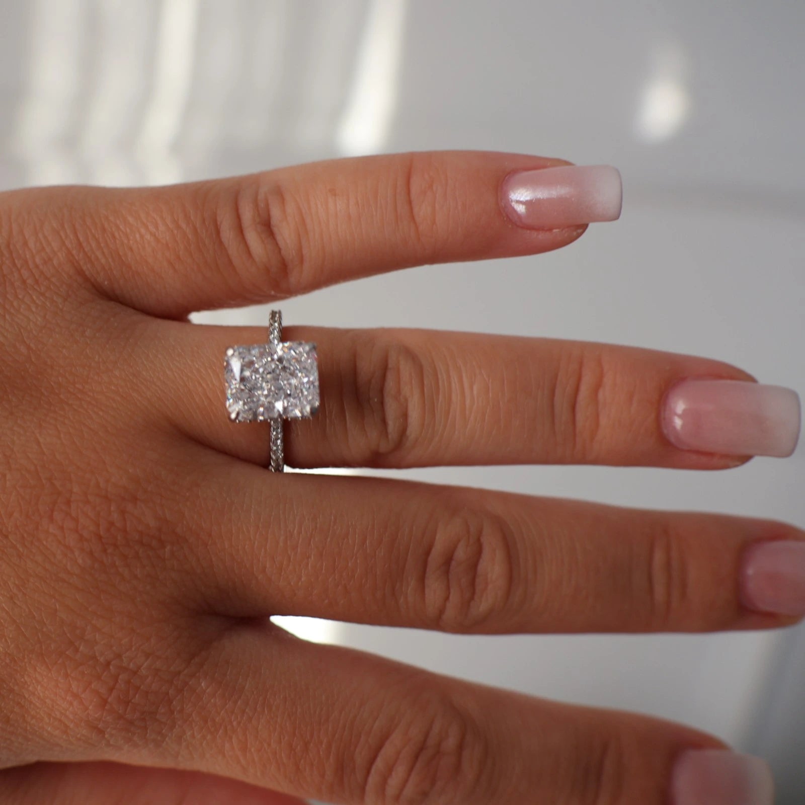 radiant cut 3.5 ct cubic zirconia ring worn on finger