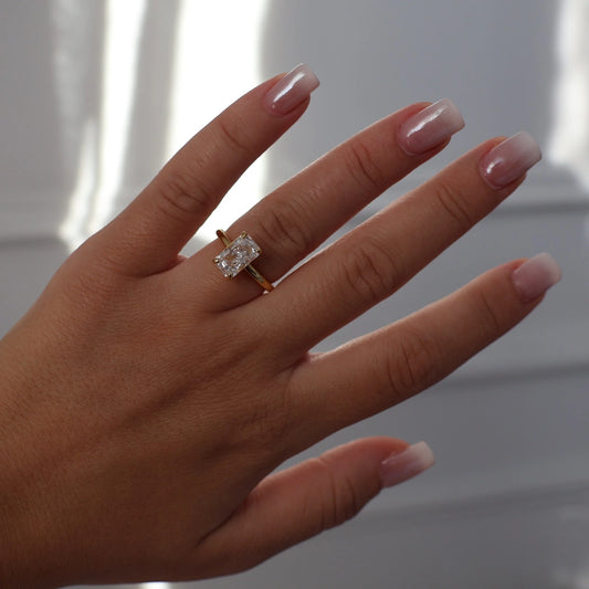 3 carat elongated radiant cut ring in gold