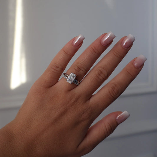 silver solitaire ring with 3 carat elongated radiant cut stone