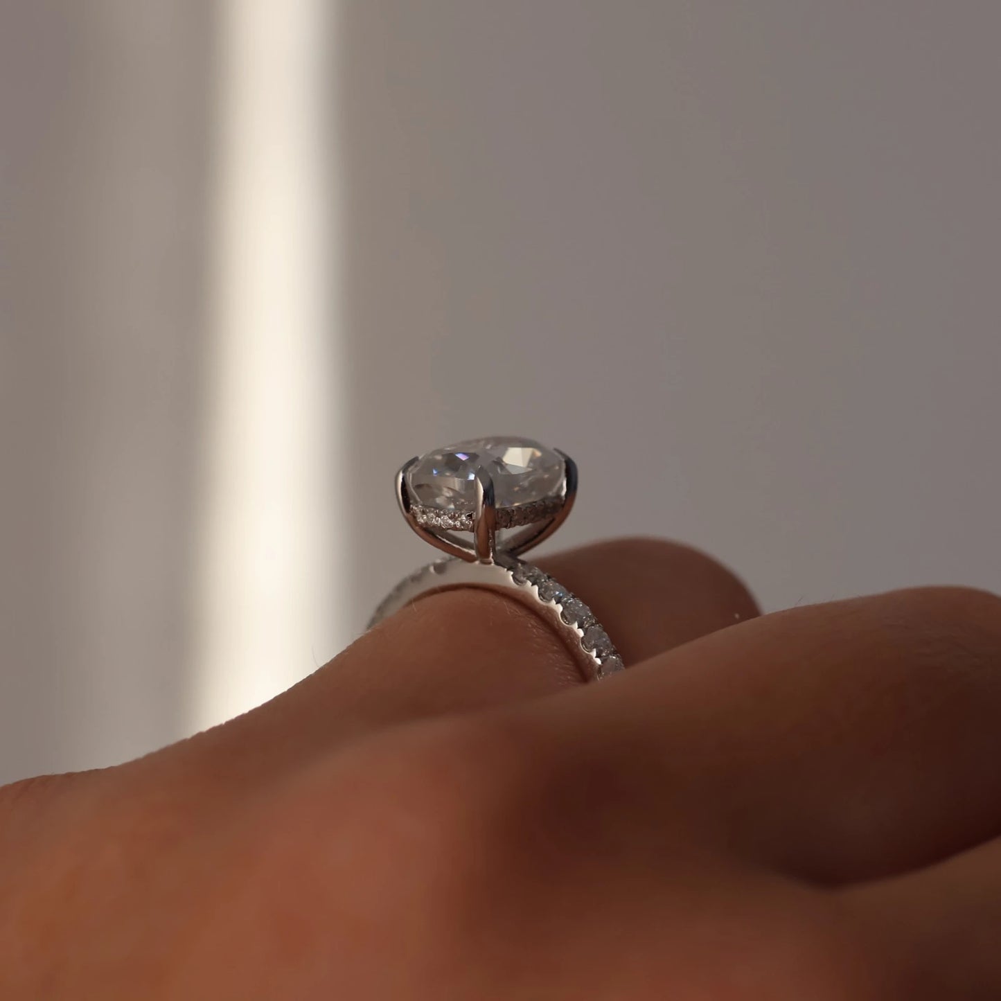 3 carat silver elongated cushion moissanite ring with hidden halo