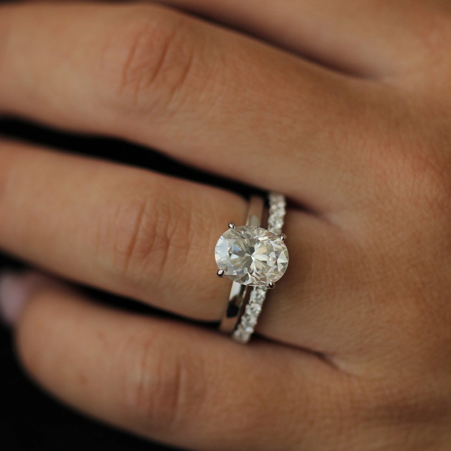 3 carat oval moissanite ring with eternity band in silver