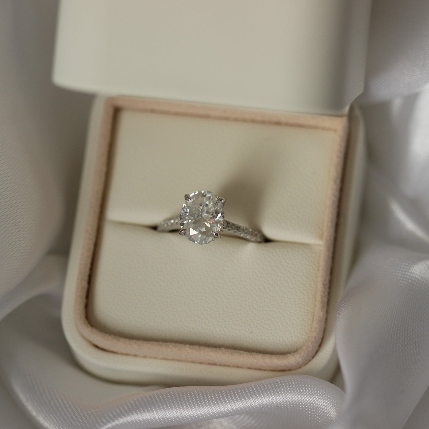 3 carat oval-cut moissanite wedding ring with pavé band