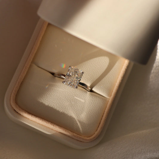 3 carat radiant cut moissanite ring in a proposal box