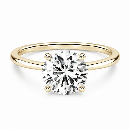 3 carat round cut gold ring on white background