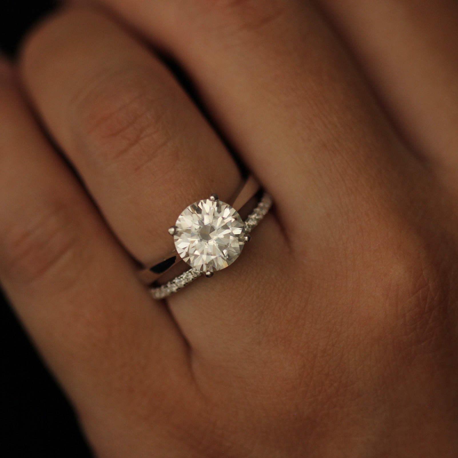 3 carat round moissanite solitaire engagement ring in a silver band