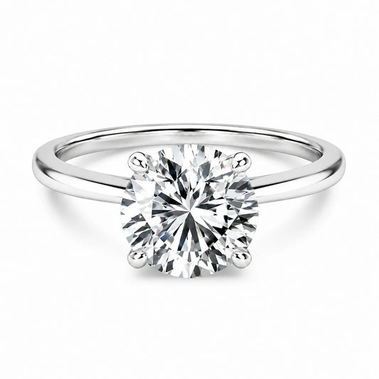 3 carat round cut silver ring on white background