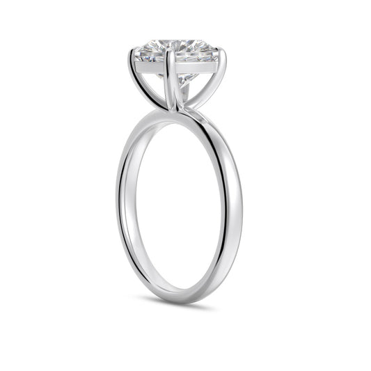 3 carat round cut silver ring side view on white background