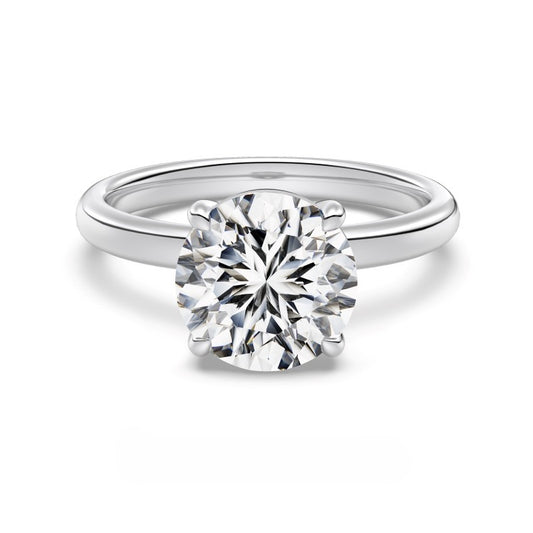 3 carat round cut silver ring on white background