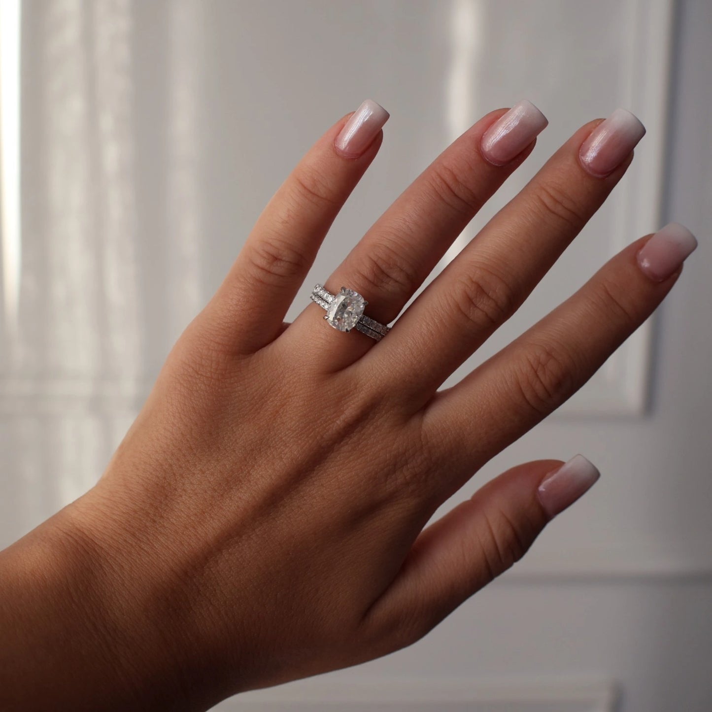 3 carat silver elongated cushion moissanite engagement ring with hidden halo