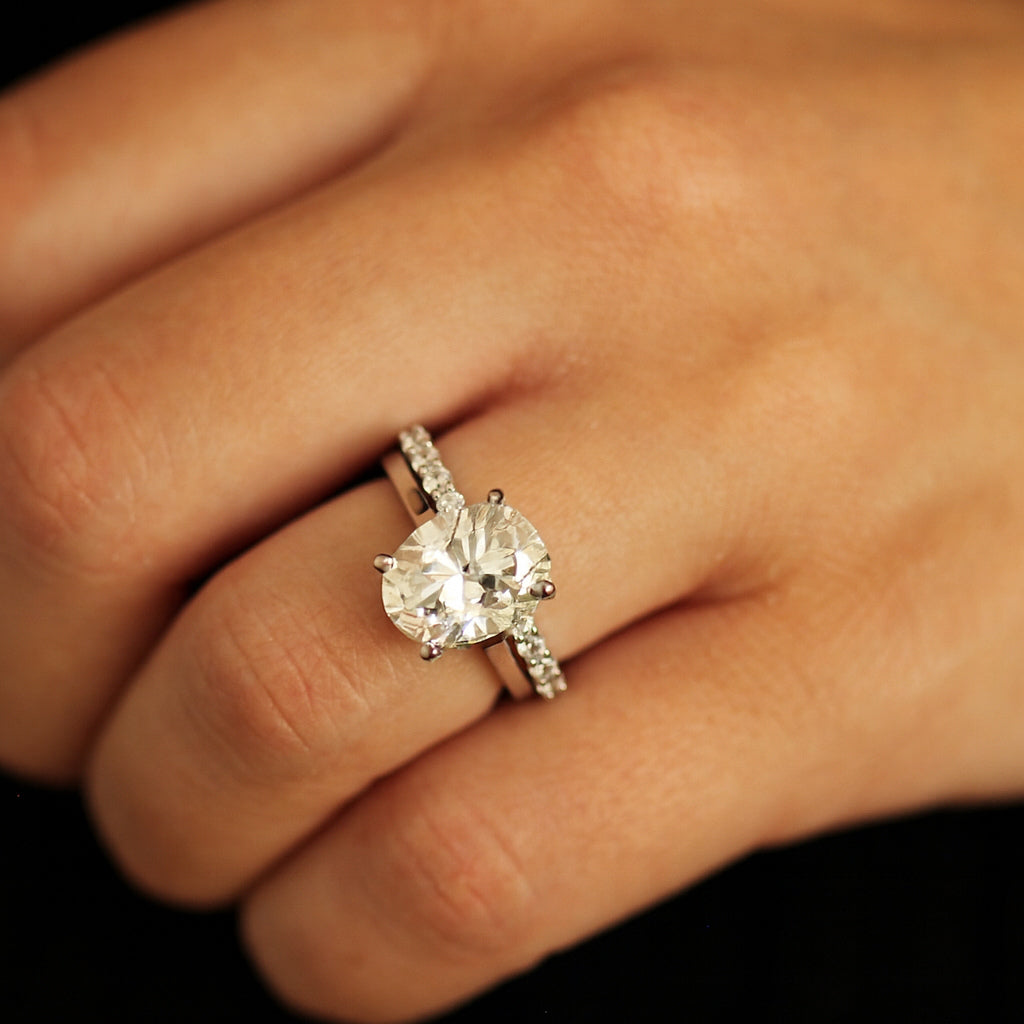 3ct oval ring with open band on hand