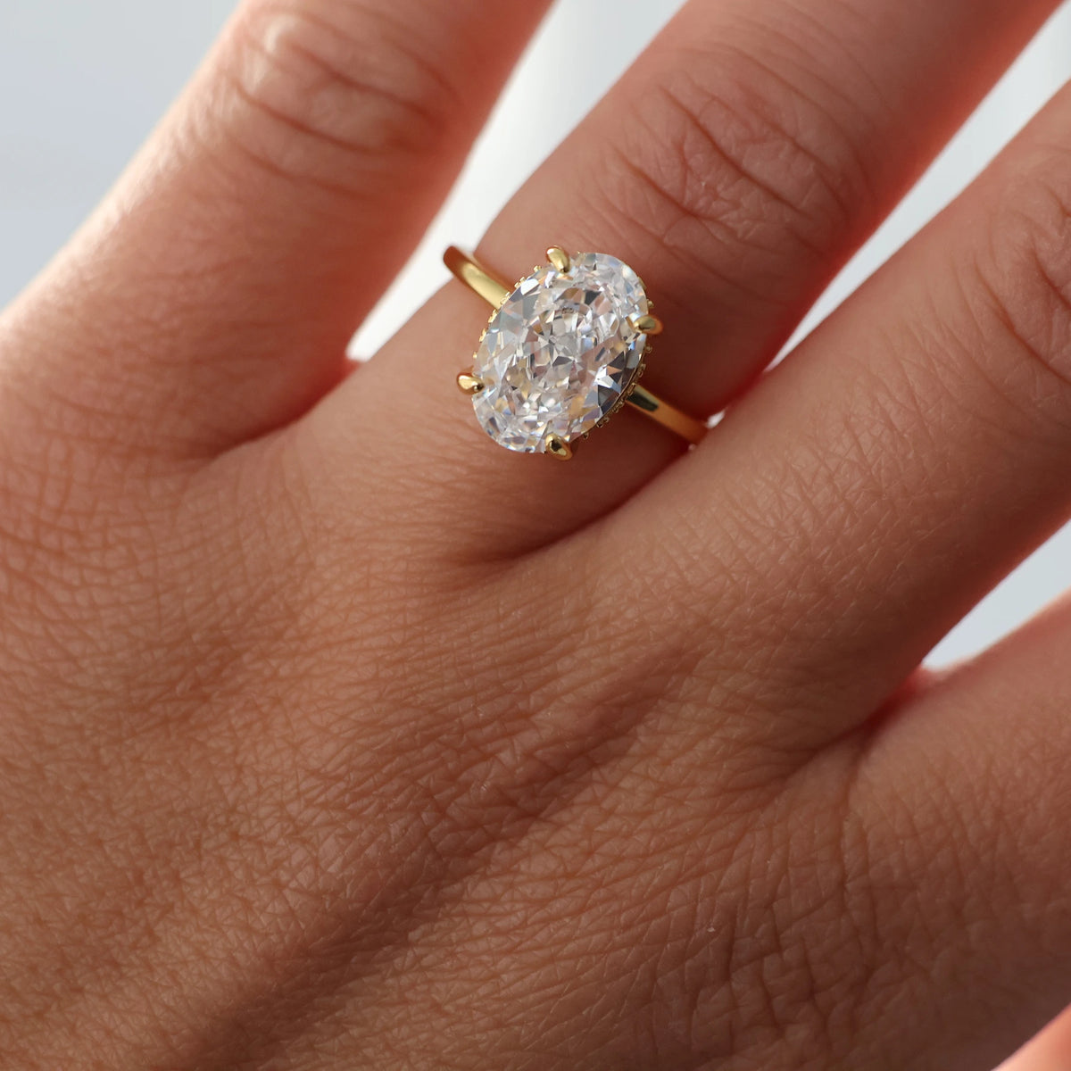 3.5 ct oval engagement ring with hidden halo in 14k gold plated cubic zirconia close up