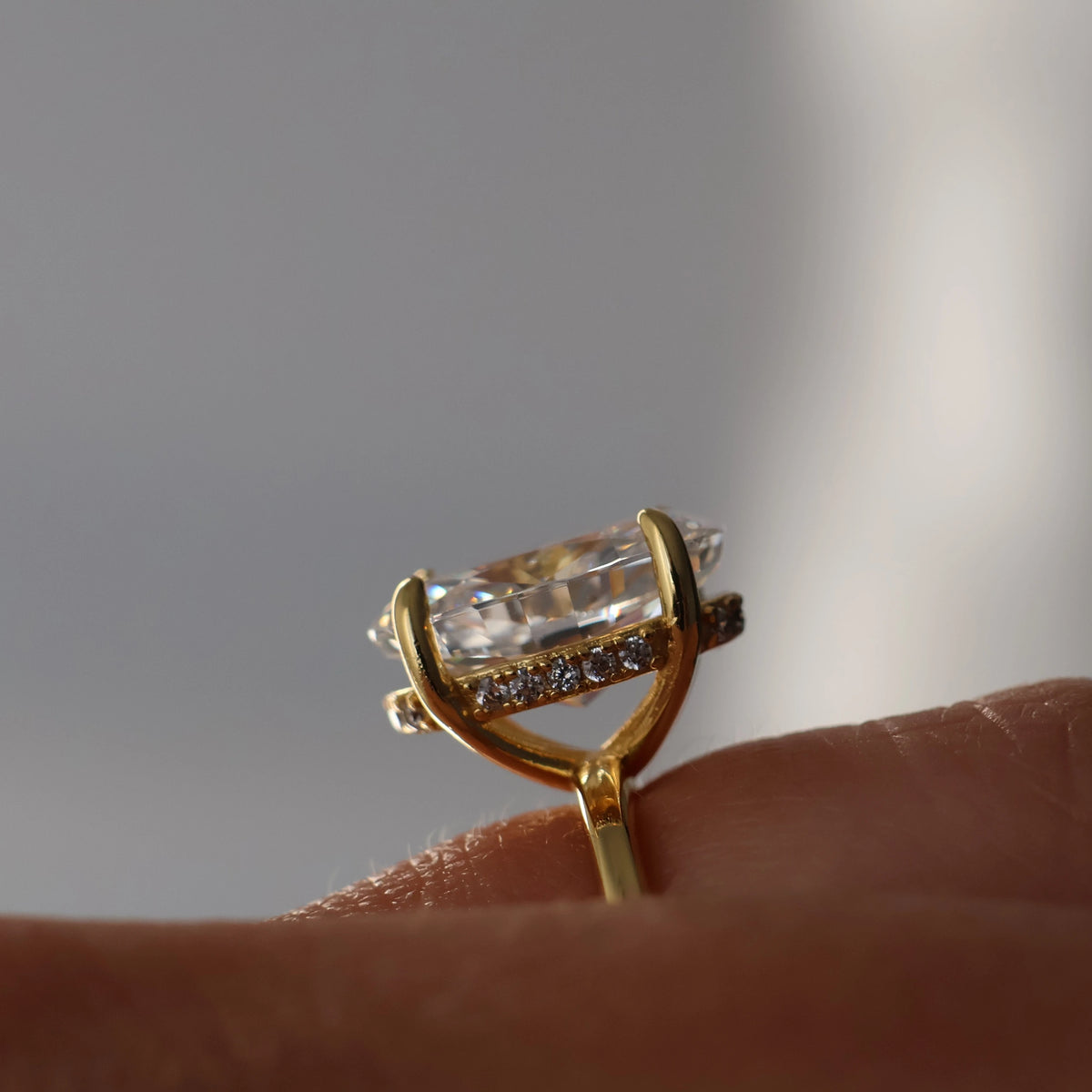3.5 ct oval engagement ring with hidden halo in 14k gold plated cubic zirconia side view