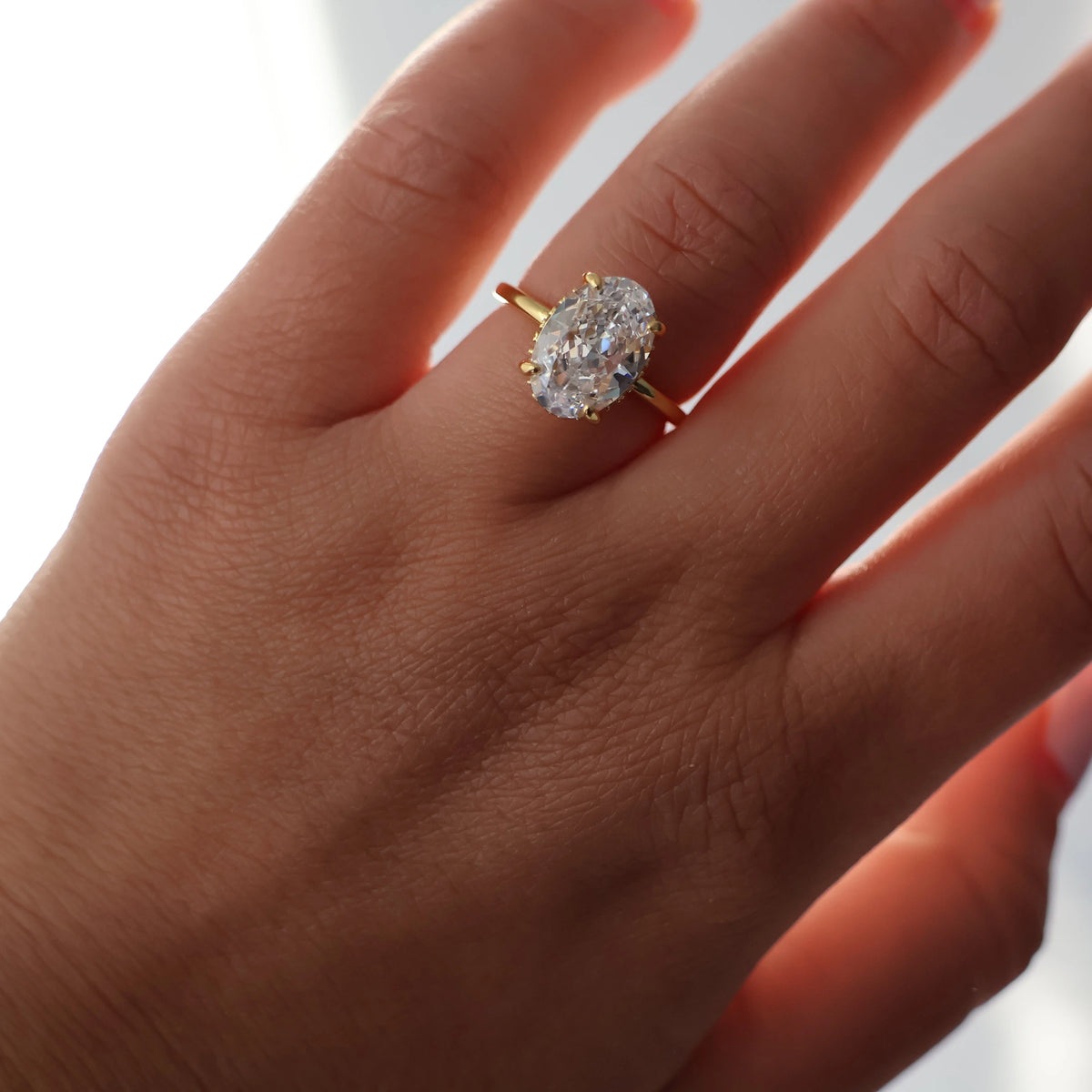 3.5 ct oval engagement ring with hidden halo in 14k gold plated cubic zirconia